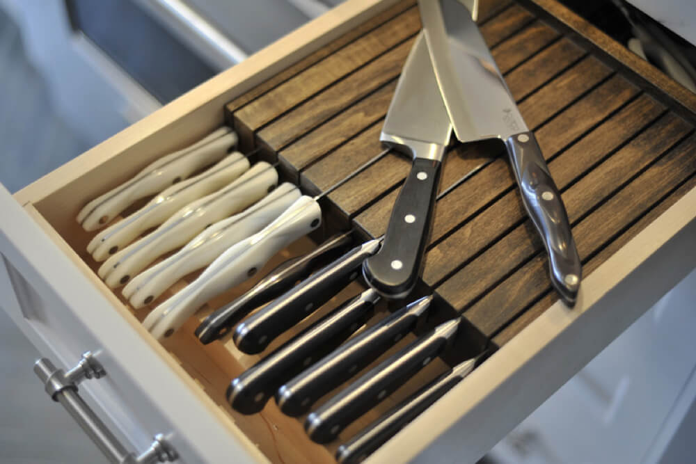 brushed nickel handle on a knife block drawer inserts with dividers after renovation
