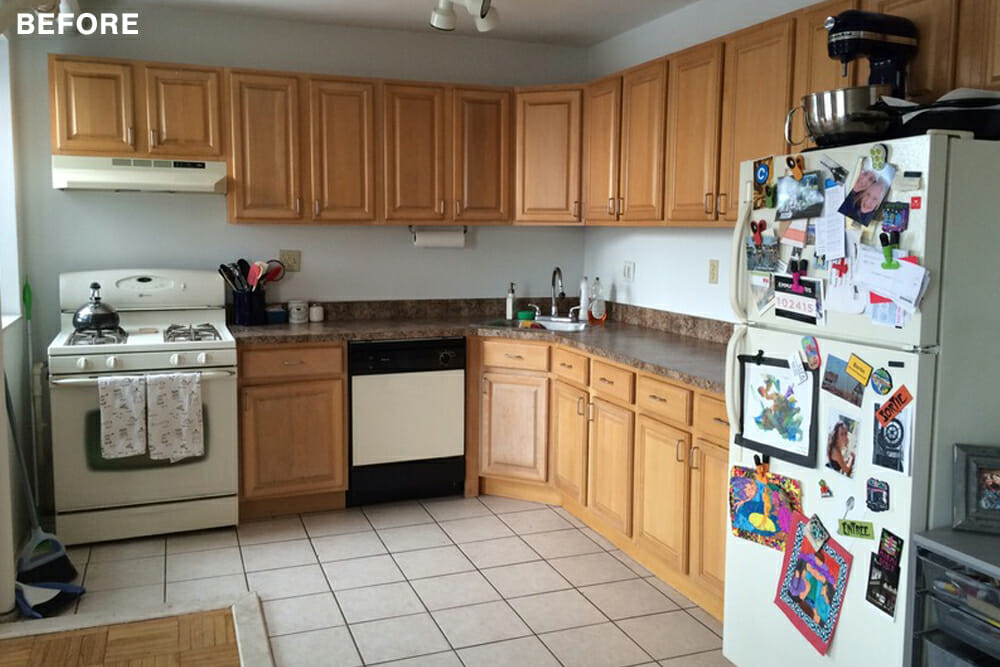 kitchen with oak cabinets and tile flooring and old appliances before renovation