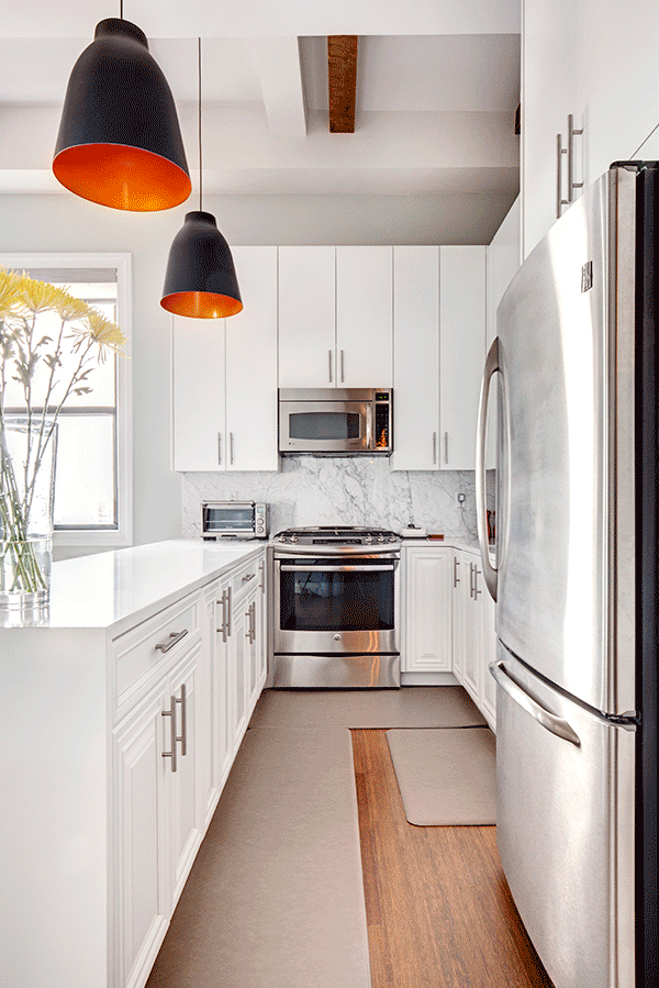 white custom cabinetry in high-end kitchen