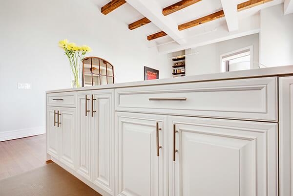 custom white traditional cabinets with gold accents