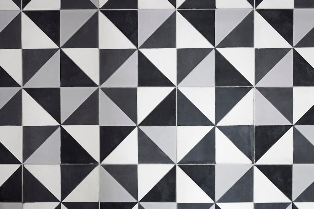 Black white gray triangle tiles with abstract pattern after renovation