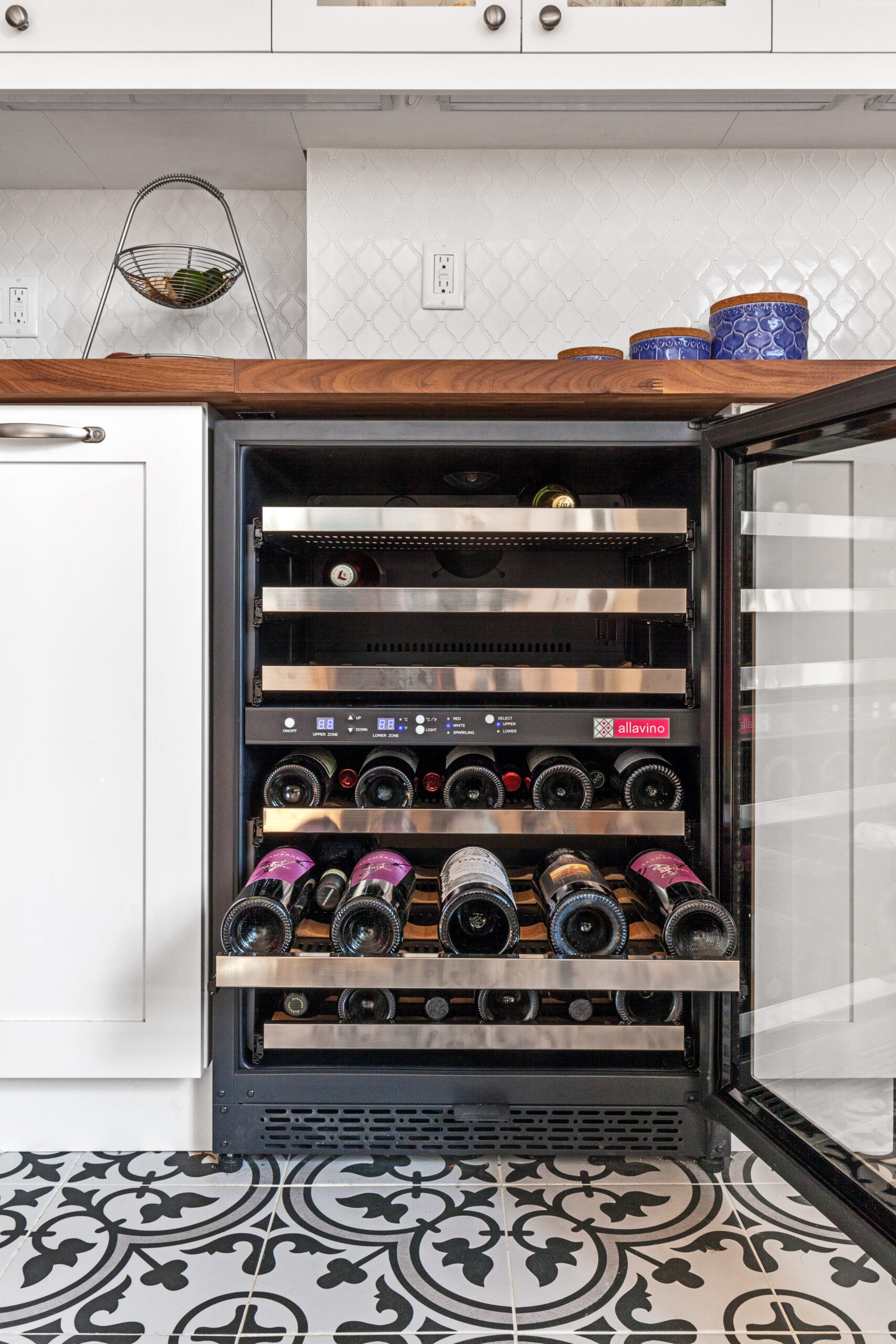 Amanda's wine fridge in her kitchen used as a beverage station