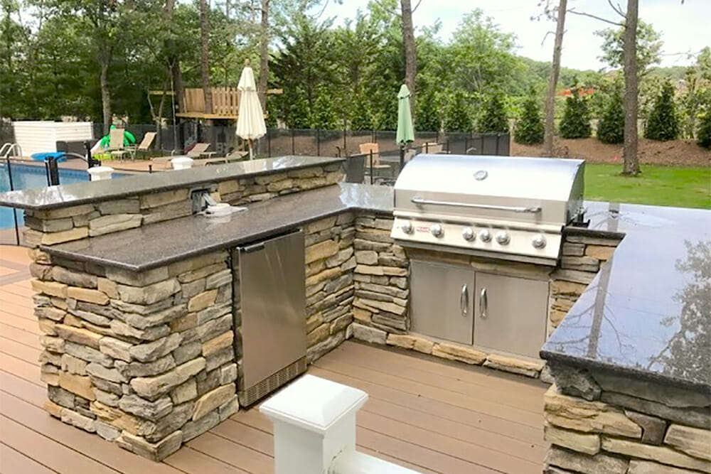 stone counter and granite countertop for outdoor kitchen after renovation