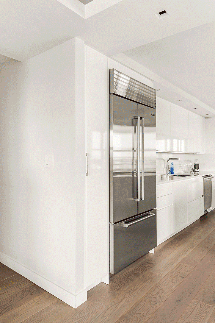A hidden, pull-out pantry gives homeowners more storage space