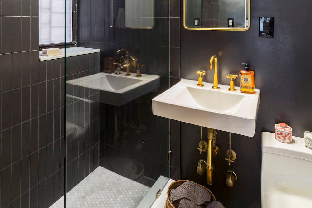 black bathroom on the upper west side with walk in shower