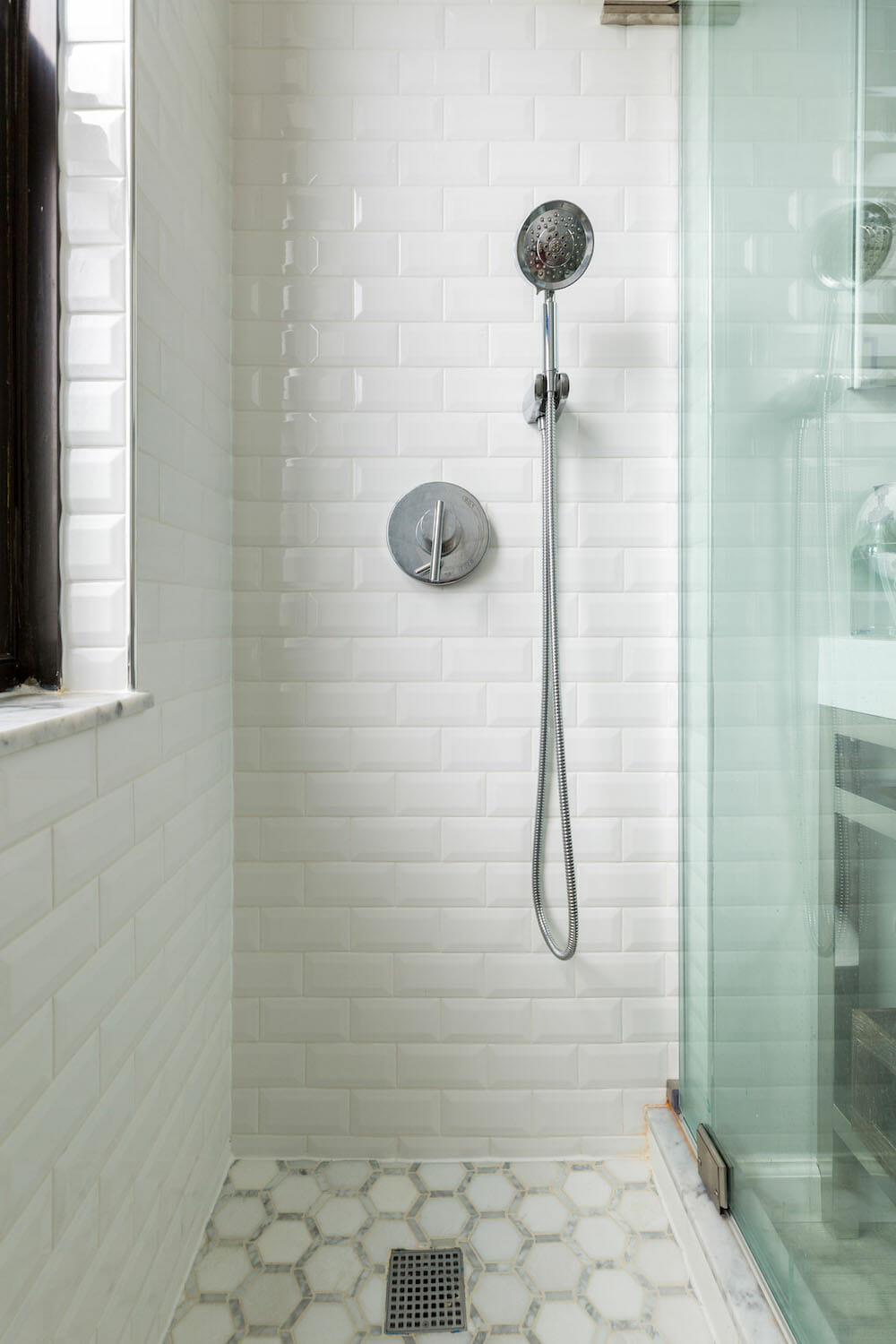 white tile shower renovation