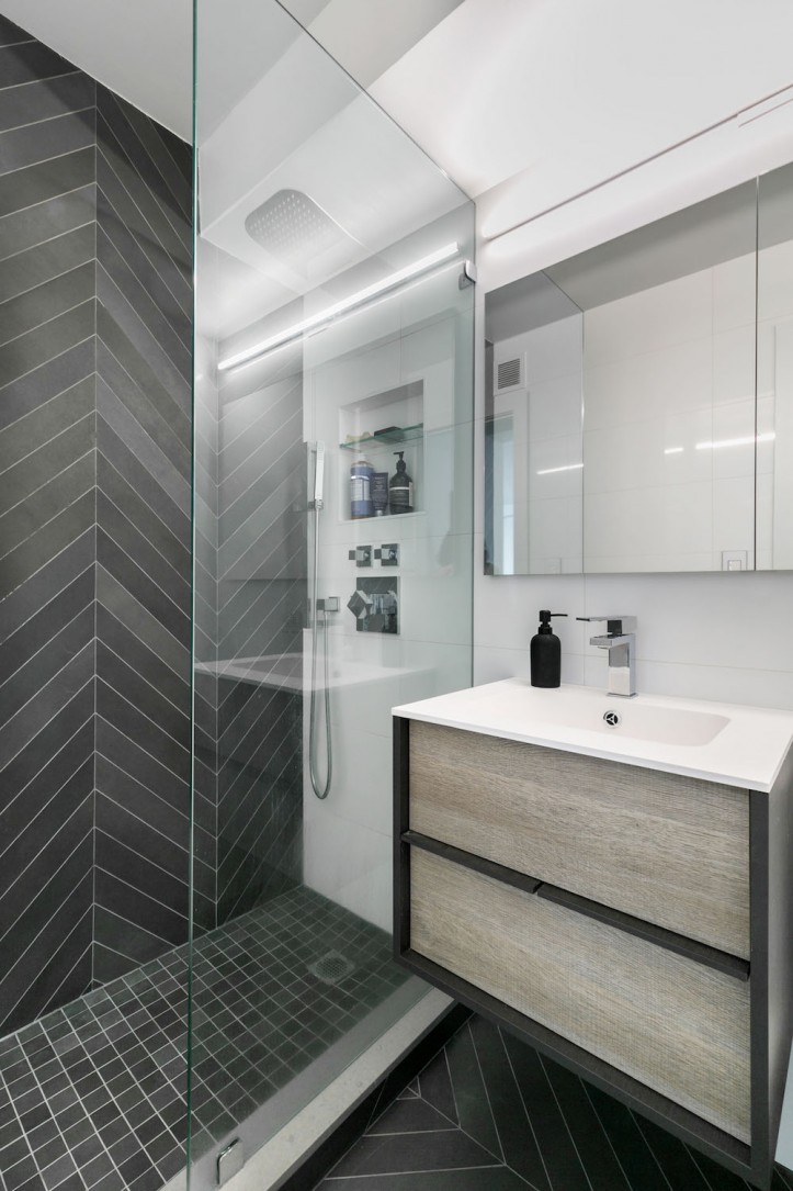 renovation, apartment combination, bathroom, chevron tile, glass shower door