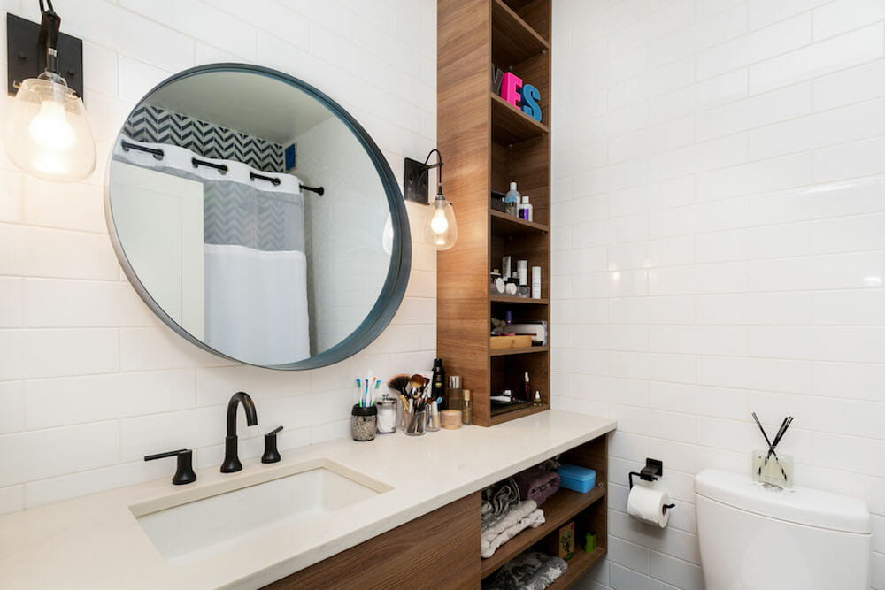 manhattan renovation, bathroom renovation, vanity, walnut, open storage, round mirror