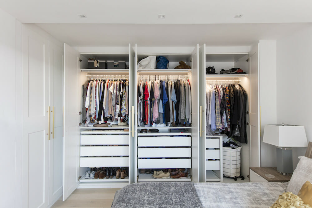 closet renovation with three doors in master bedroom