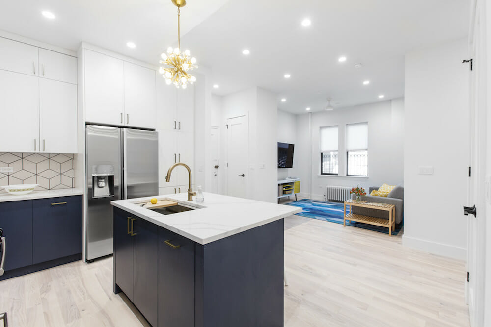 Combining two apartments gave this couple a spacious kitchen a room to grow their family in the city