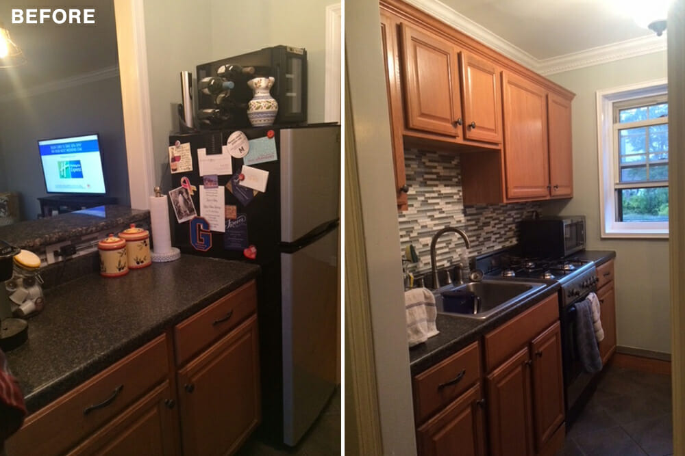 kitchen with oak cabinets and black countertop and beige walls before renovation