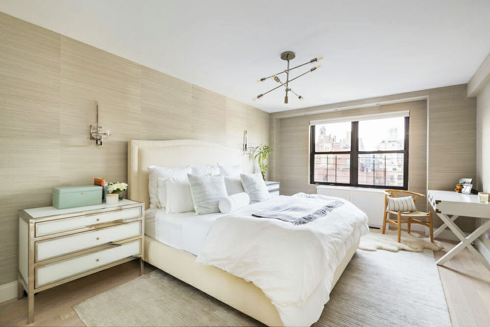 master bedroom with textured tan hemp wallpaper