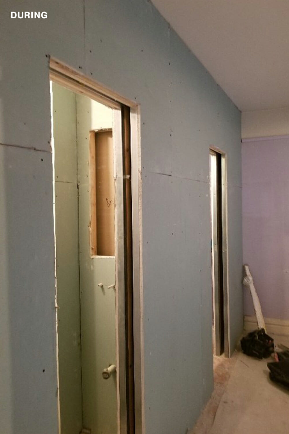 photo of drywalls cut and laid on two doorways during renovation