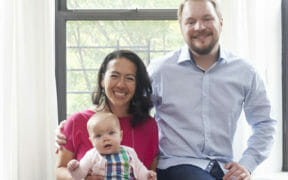 photo of tara with her husband and baby after renovation