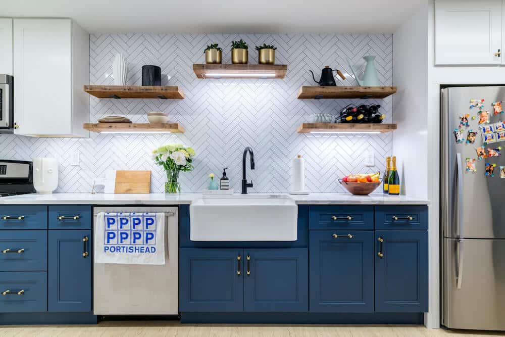 kitchen remodel in park slope with blue cabinets and herringbone backsplash