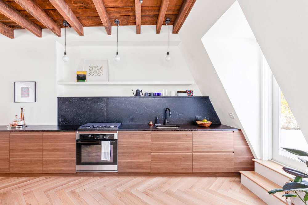 Ikea kitchen with soapstone backsplash in a brownstone remodel