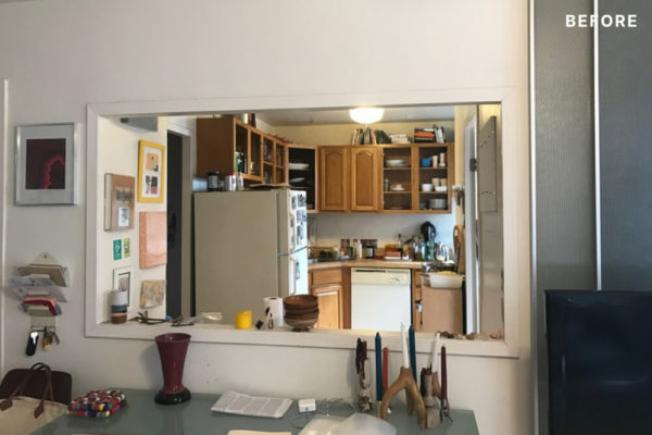 serving hatch for a brown kitchen with cabinets before renovation