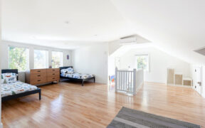 attic renovation with dormer and beds