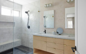 Los Angeles bathroom remodel with seated shower and double sinks