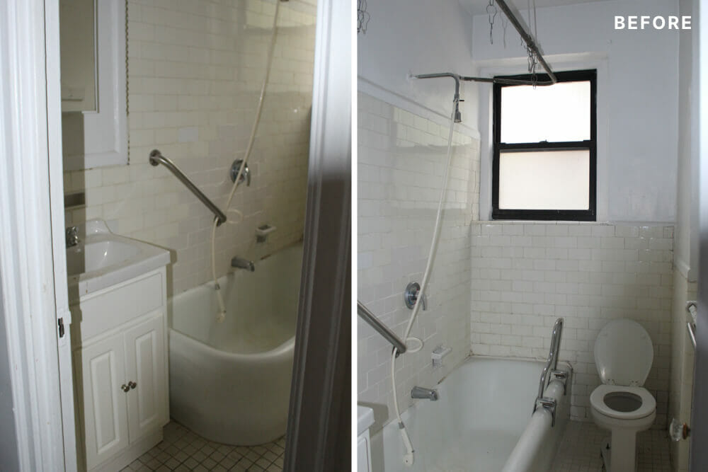 white bathroom with white toilet and double hung window before renovation