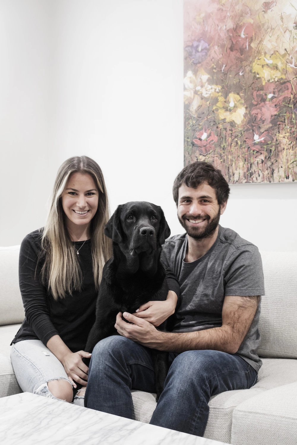 Portrait of the renovators with their dog