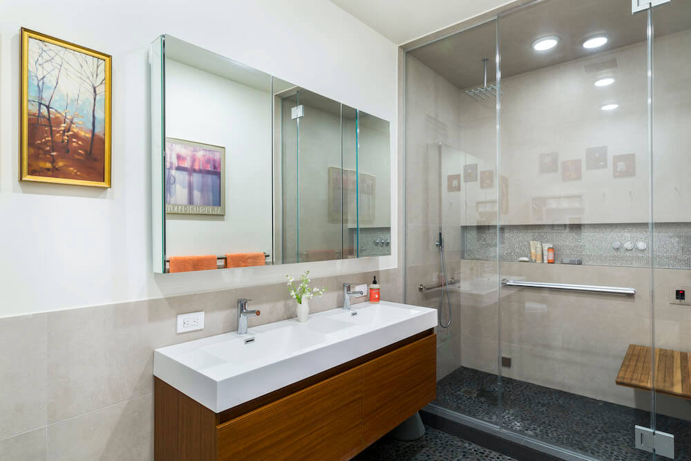 Image of a wall hung vanity and steam shower