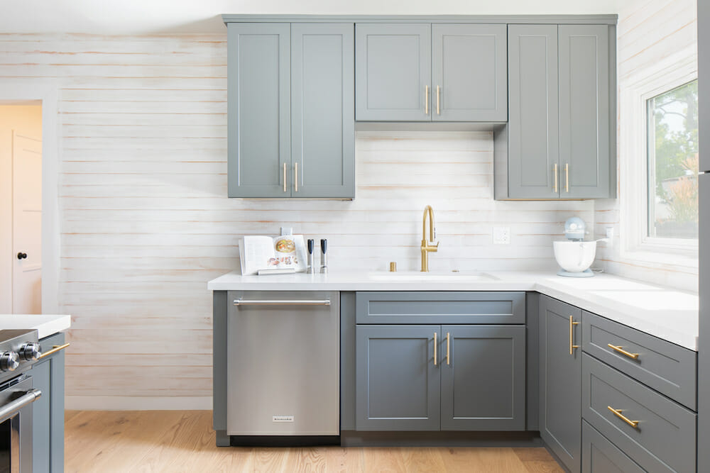 blue shaker cabinets with white washed walls