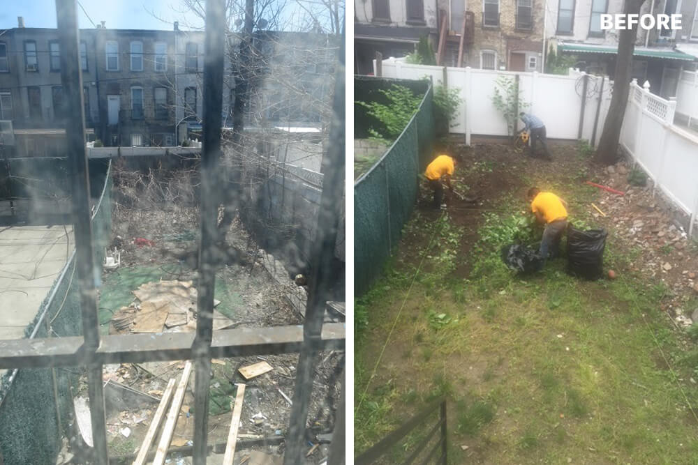 workers clearing the backyard to begin work for renovation