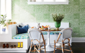 Chicago home design trends breakfast nook with banquette and green wallpaper