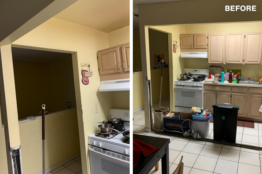 Beige kitchen closed cabinets over white tile flooring before renovation
