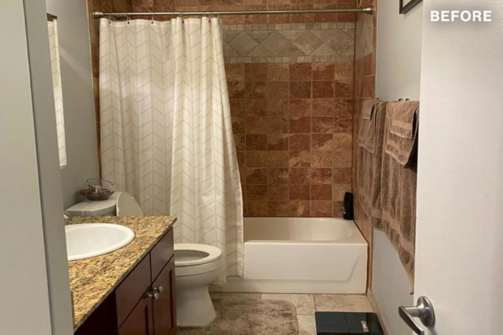 Small brown and white bathroom with bathtub and bathroom vanity with granite countertop before renovation