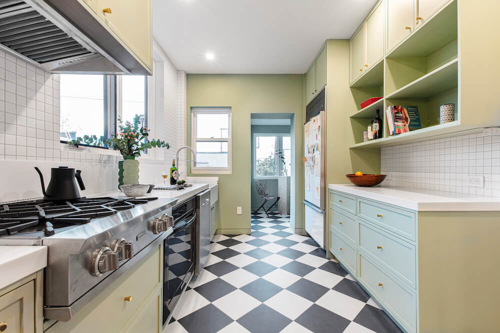 Image of a newly renovated kitchen with checkerboard floor and green walls