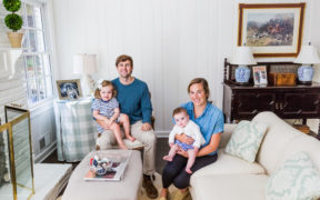 Portrait of the Ramsey family sitting in their renovated den