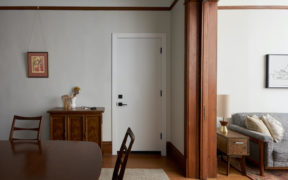 Entryway with dark wood room partition