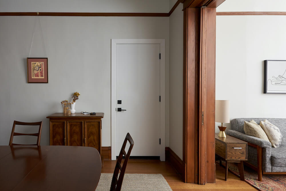 Entryway with dark wood room partition