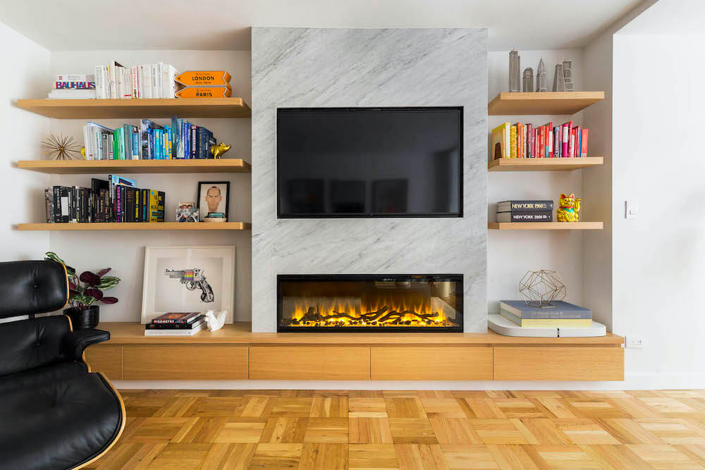 Electric fireplace with TV and gray marble