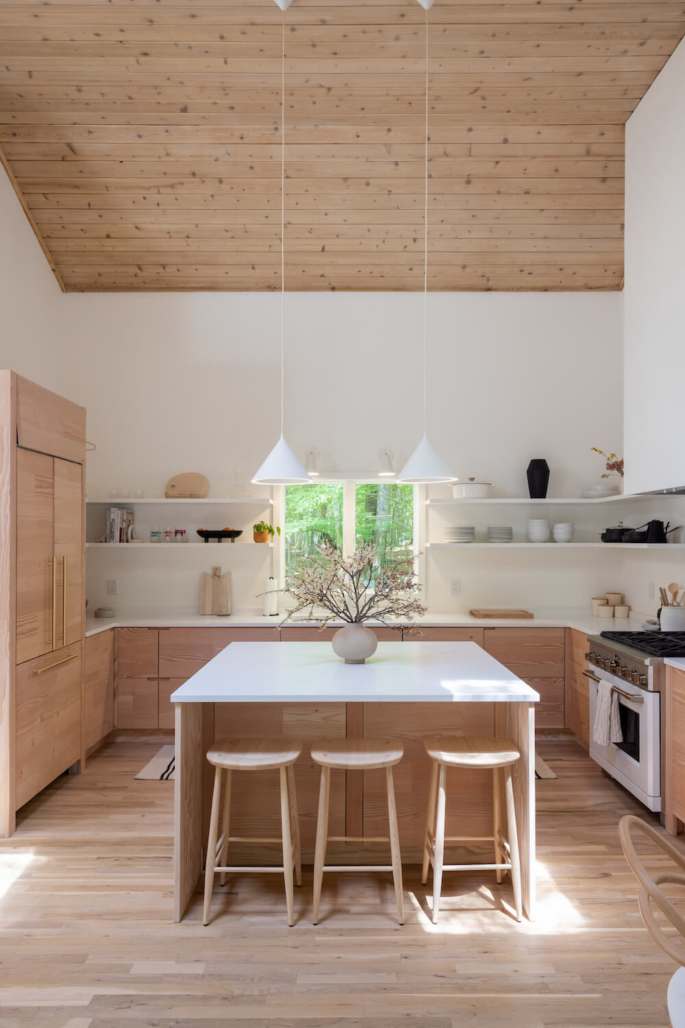 natural wood Kitchen cabinets with island and bar seating