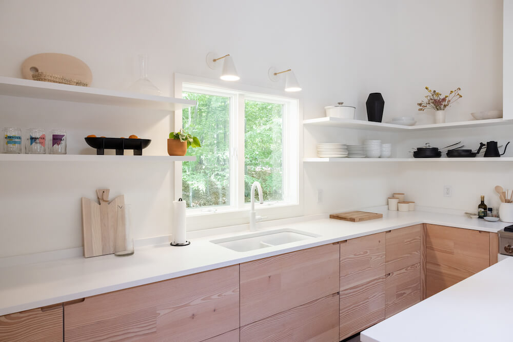 natural wood Kitchen cabinets with white counters and open shelving