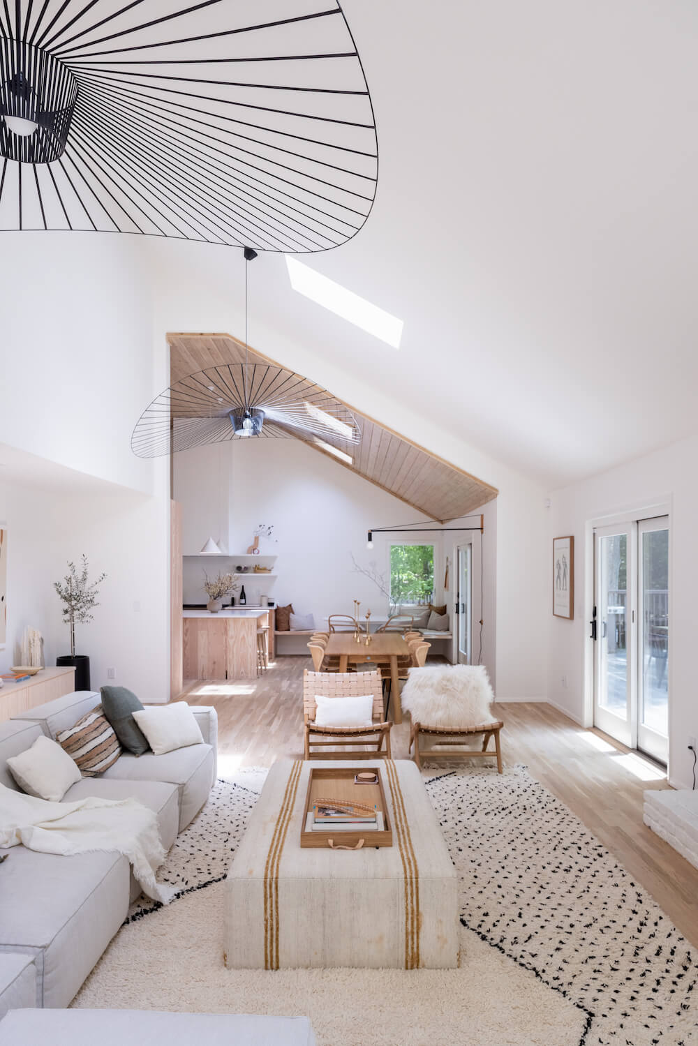 Open plan living dining and kitchen area in amagansett beach house