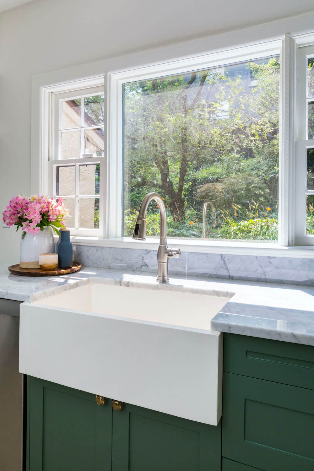Kitchen sink with gray marble countertops