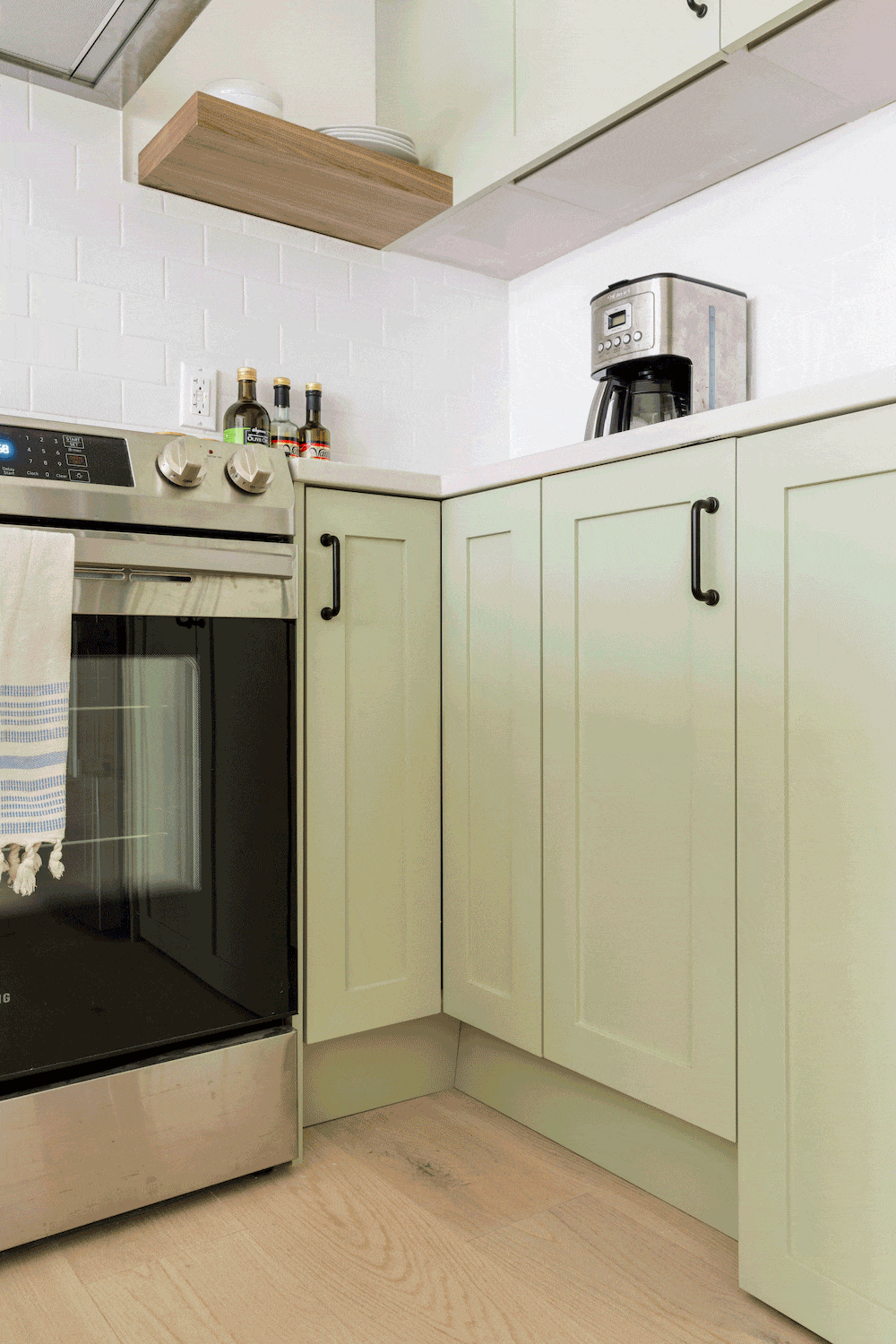 Corner cabinets expose built-in kitchen storage shelving