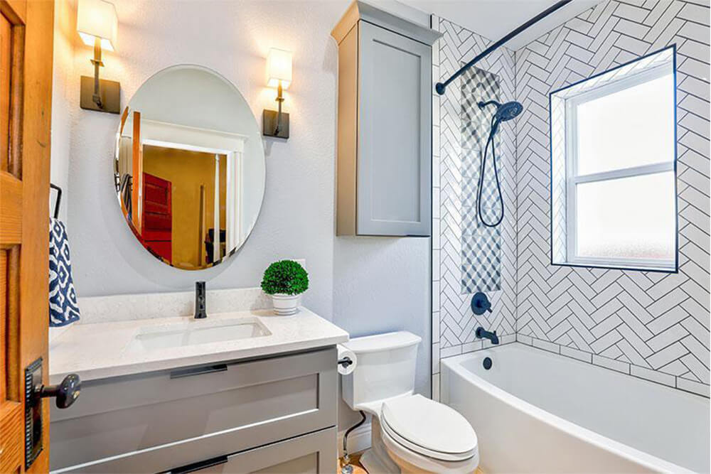 Bathroom with herringbone shower tile