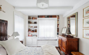Custom built-in bookshelves in a bedroom