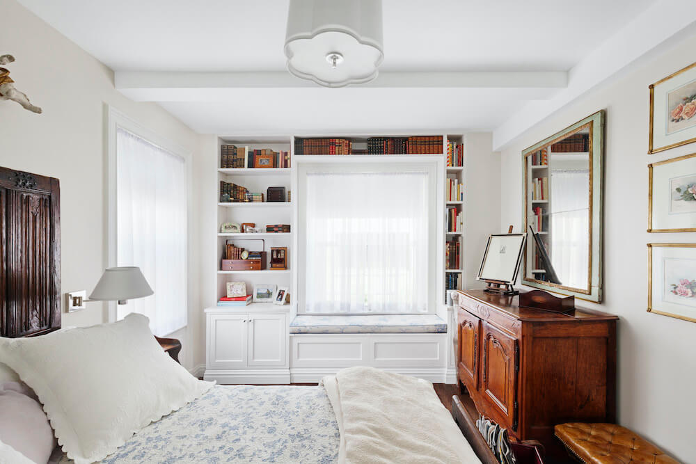 Custom built-in bookshelves in a bedroom