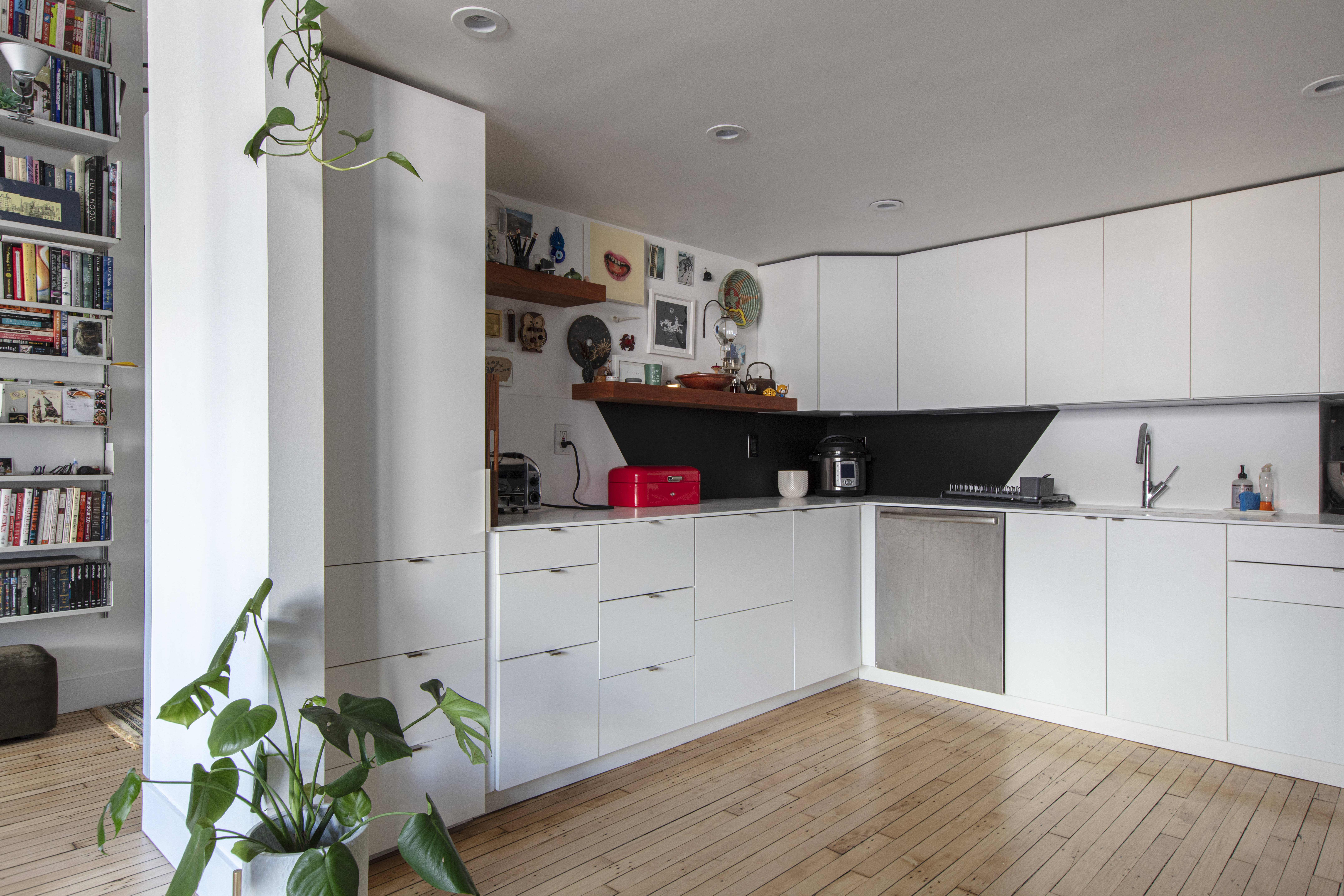 eco kitchen with white cabinets