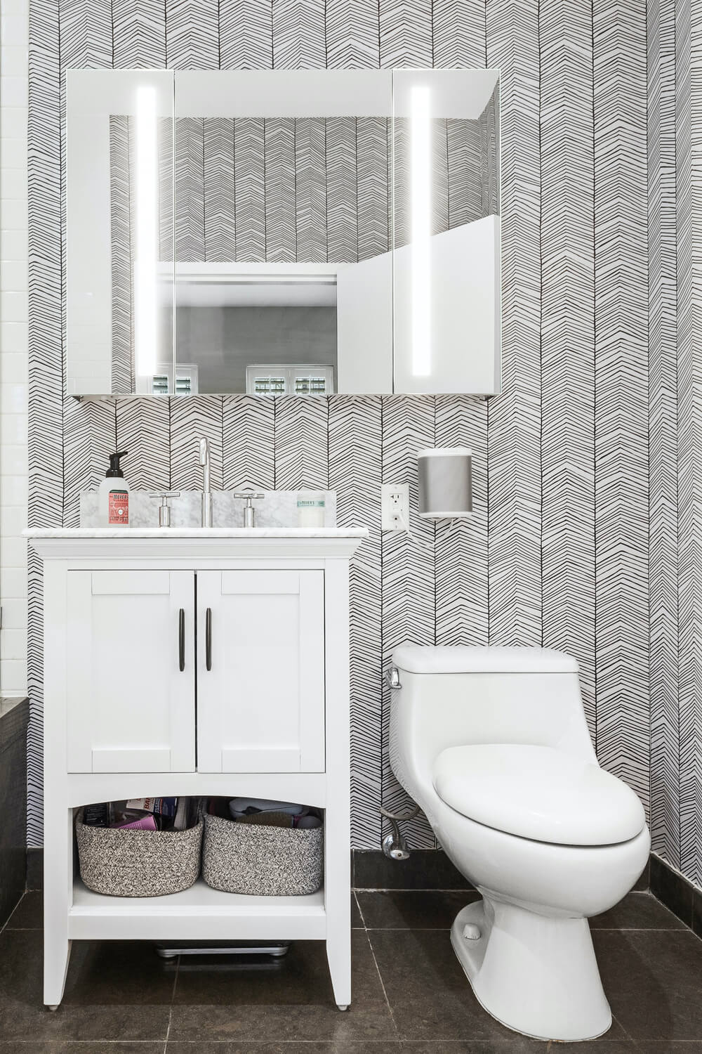 Herringbone wallpaper and slate looking tiles