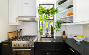 Two-tone black and white kitchen cabinets
