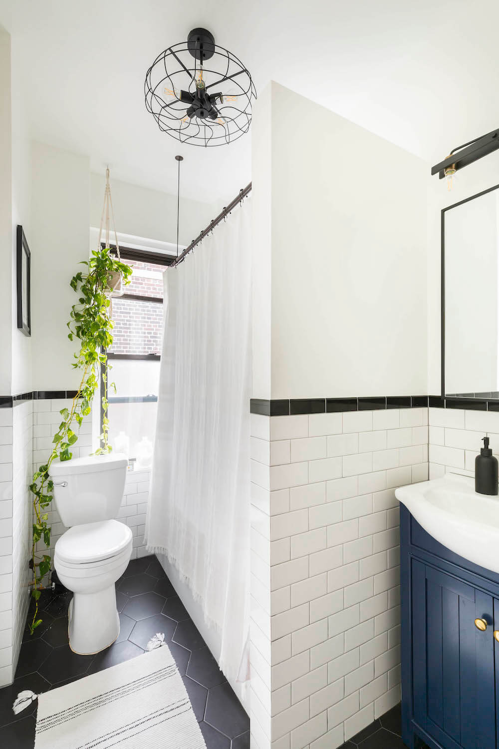 Black and white tile bathroom remodel
