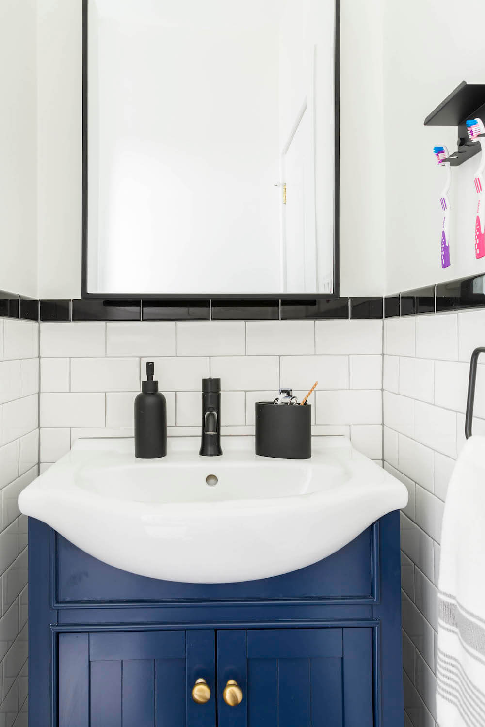 Blue bathroom vanity with cabinets