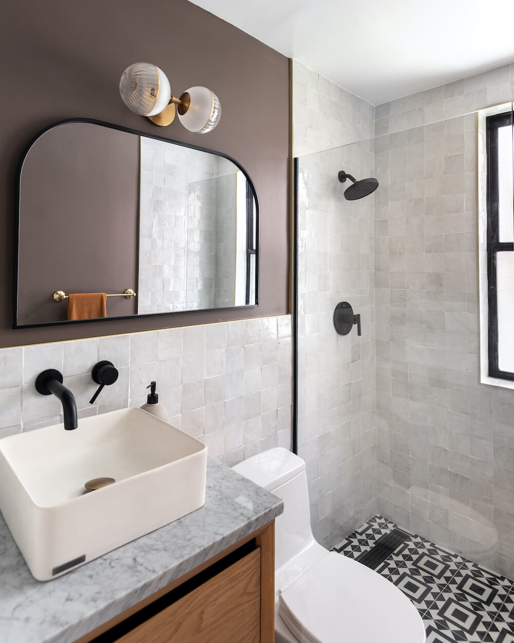 small bathroom remodel washington dc with plum walls, wall mount faucet and white square tile